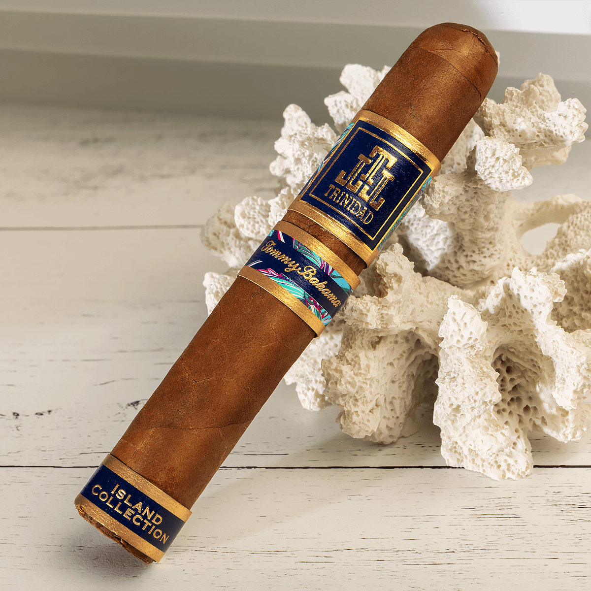 Island Collection cigar resting on coral